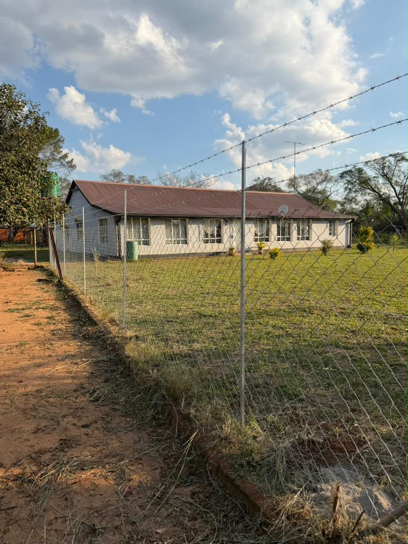 Long farm boundary fence line installed by GildArts